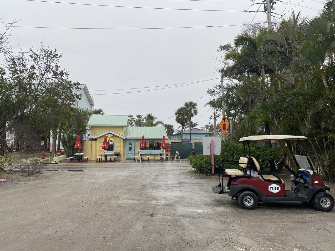 This is the Bubble Room parking lot with a Golf Cart that
      says "Yolo."