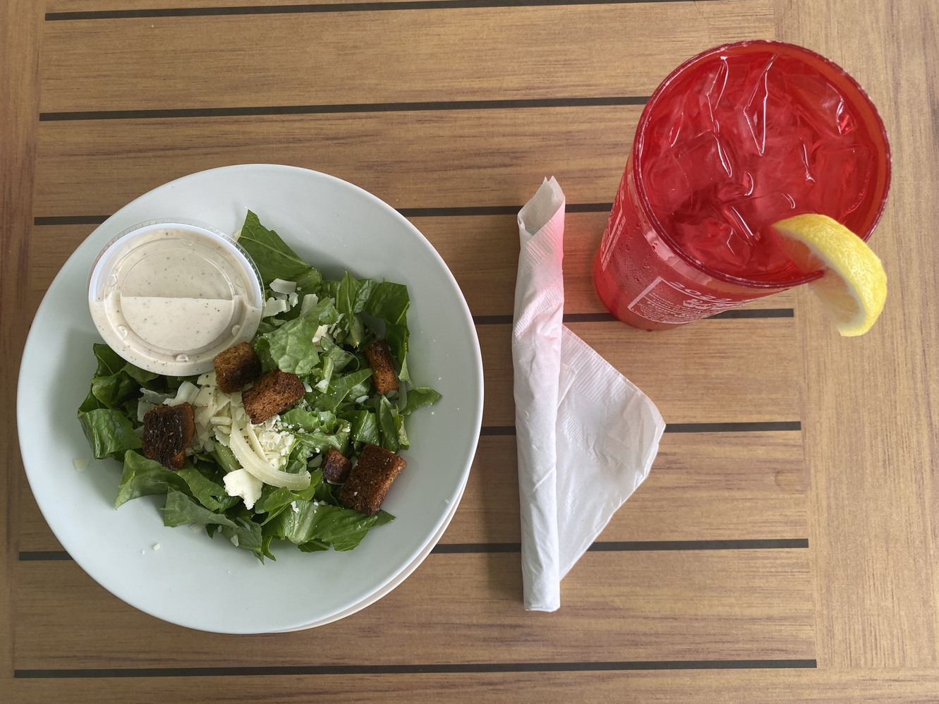 This Caesar side salad had incredible pieces of parmesan
      cheese.