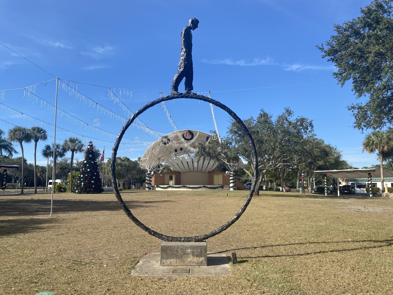 Setting the Pace is a larger-than-life bronze circular
      sculpture.