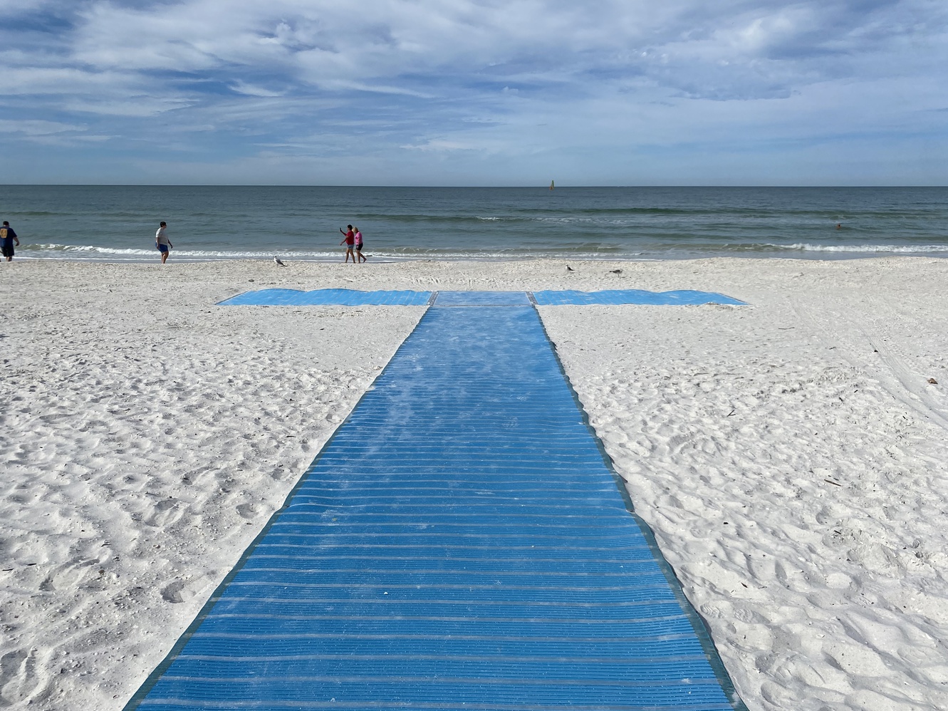 The beautiful blue boardwalk will deliver beachgoers straight
      to the ocean.