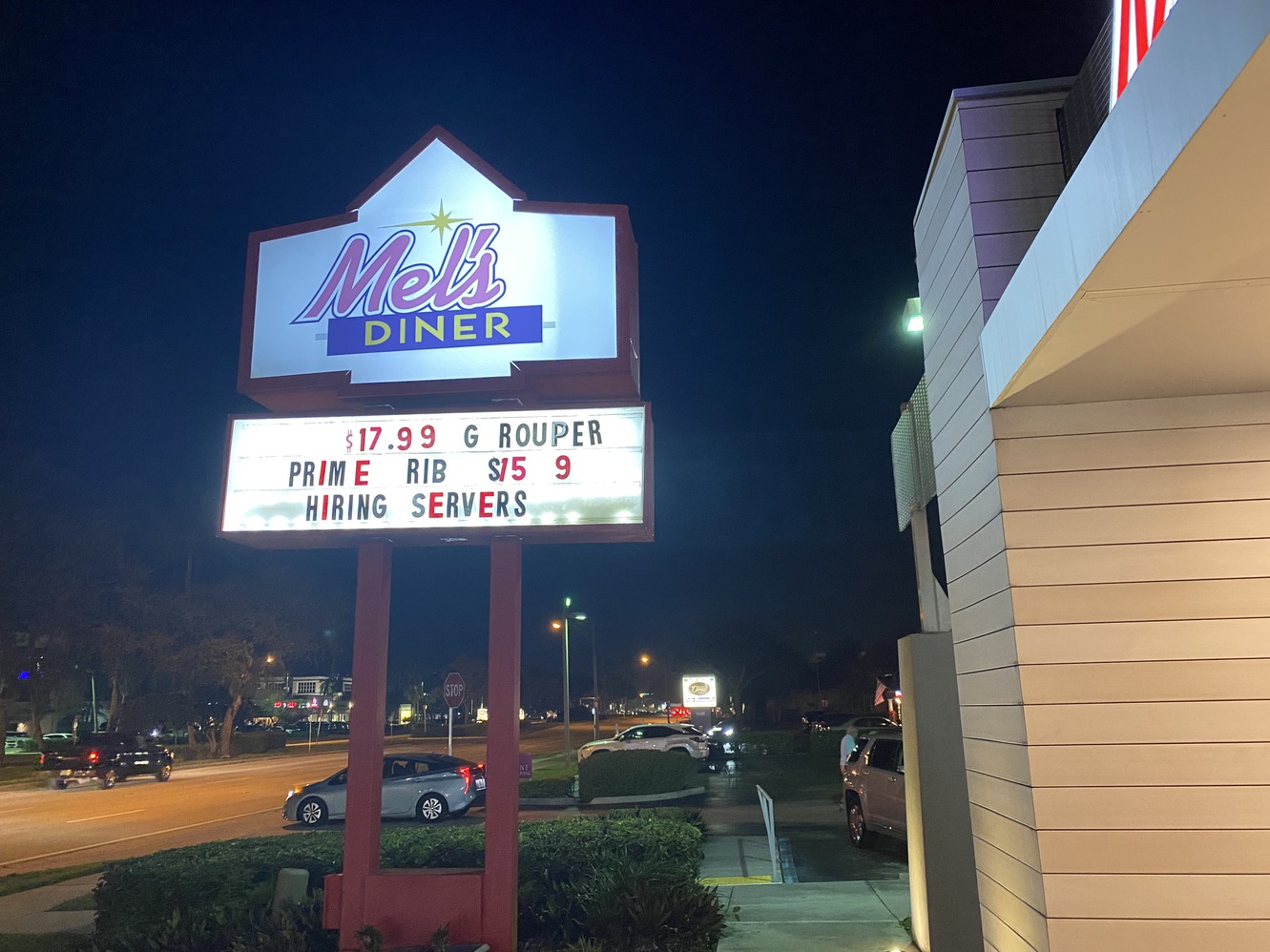 Mel's
              Diner marquee sign at night
