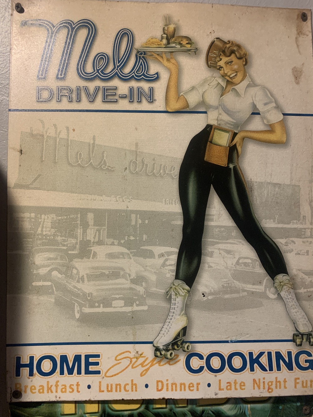 This old tin sign at Mel's is big on nostalgia.