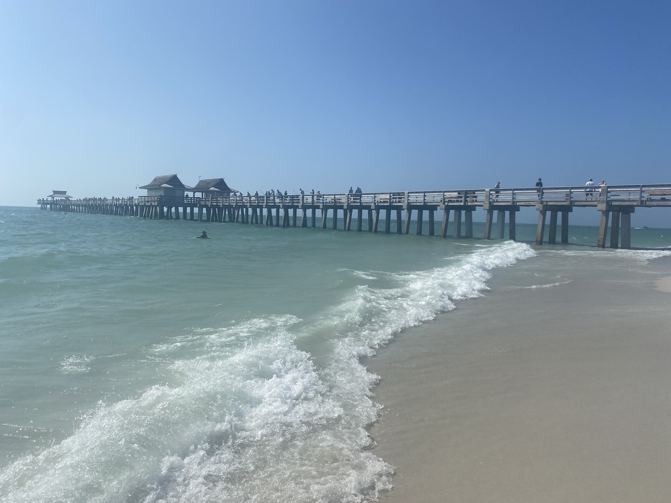 High tide will come in one hour at Naples Pier.