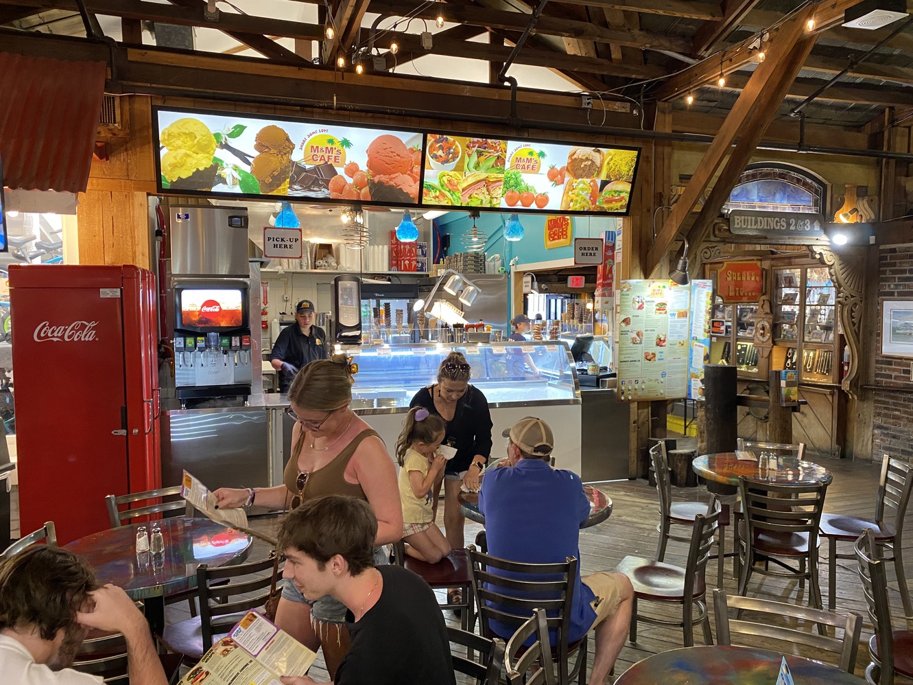 There is an ordering window and a pick-up counter at
      M&M's.