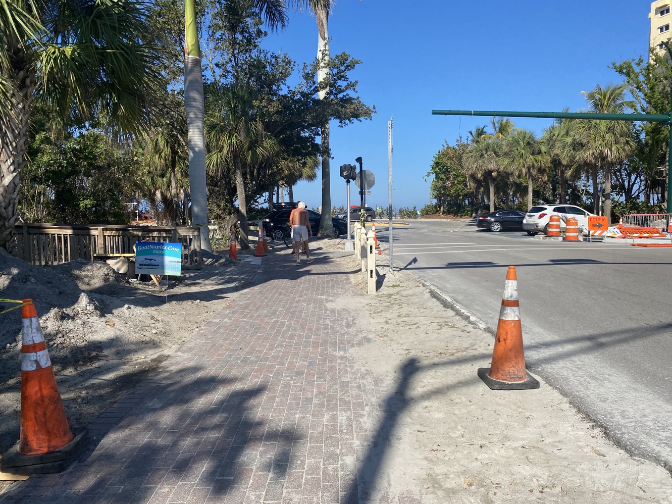 The sidewalk at
      Vandy Beach still shows lingering signs of Hurricane Ian.